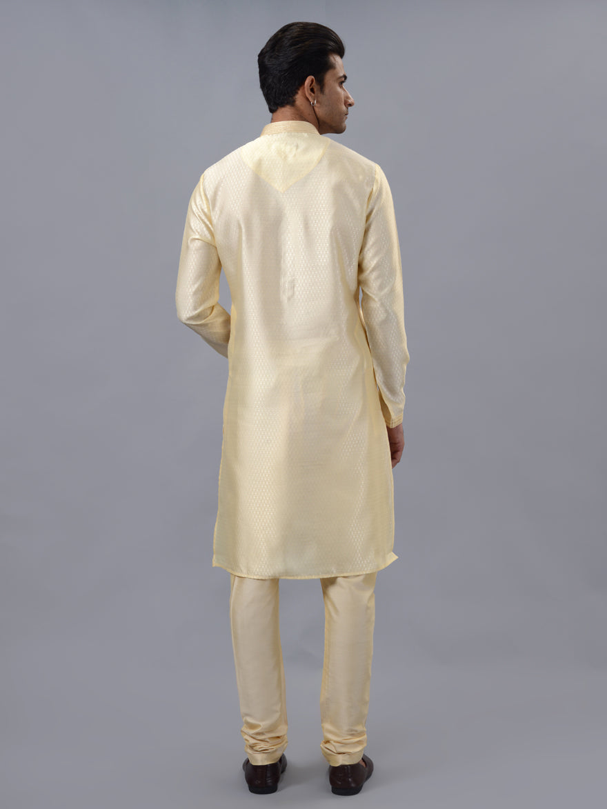 Luxurious golden silk blend kurta pajama set for men, designed for special occasions and celebrations.