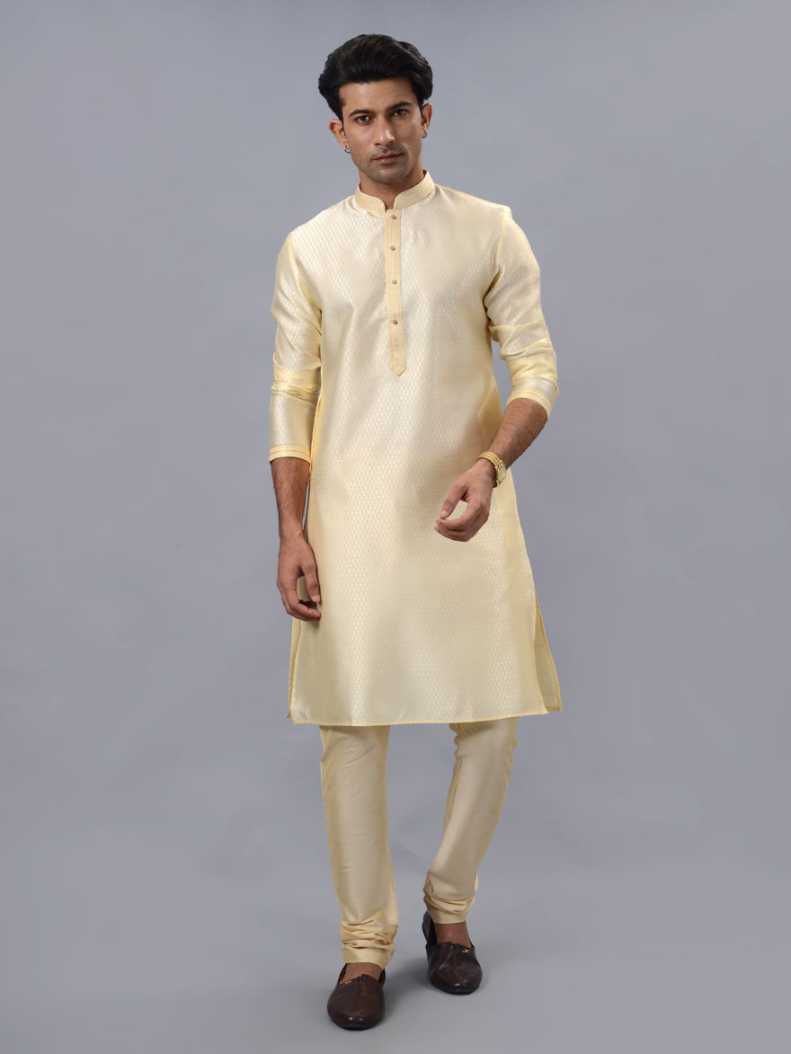 Traditional golden kurta pajama set for men, ideal for cultural events, weddings, and pooja.