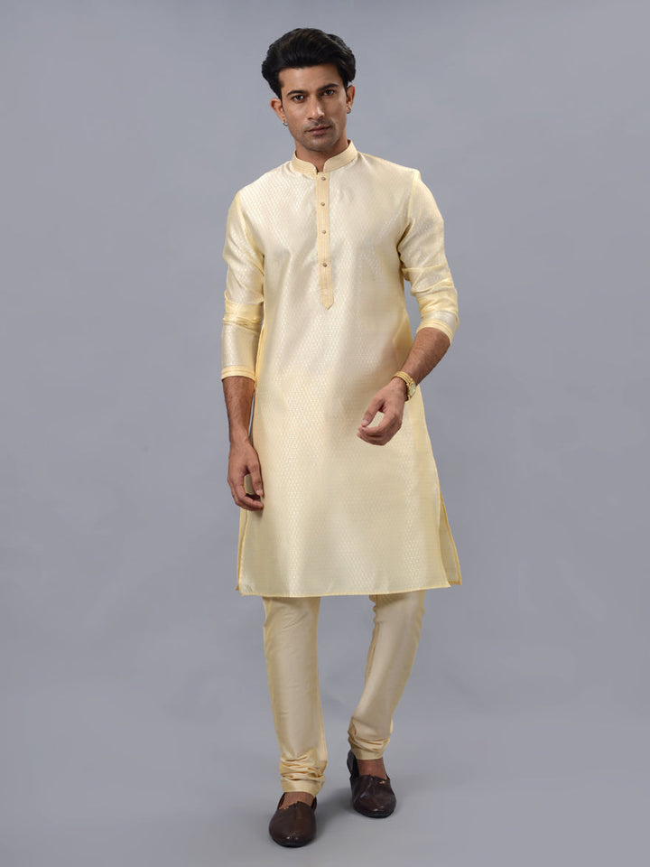 Traditional golden kurta pajama set for men, ideal for cultural events, weddings, and pooja.