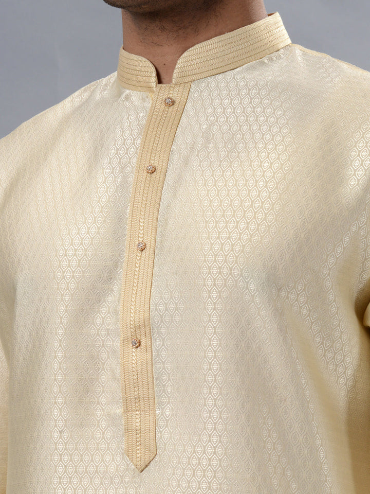 Golden silk kurta pajama set for men, ideal for luxurious and traditional wedding celebrations.