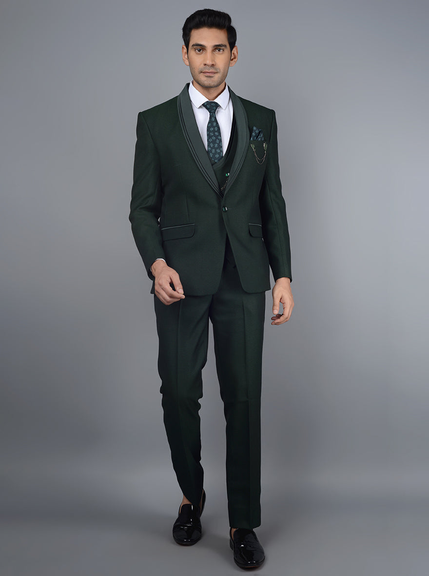 Designer green suit for men, a stylish tuxedo perfect for special occasions, combining elegance and modern flair.