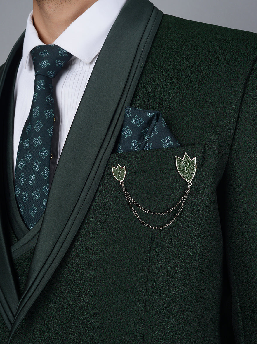 Stylish designer green tuxedo for men, perfect for special occasions, featuring a modern fit and unique color.