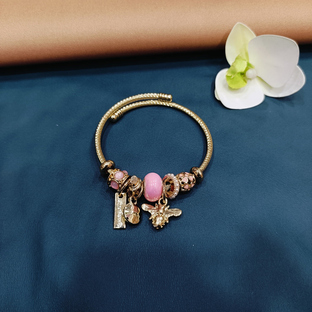 Classic Pandora bracelet designed to hold your cherished charms, a sentimental gift for loved ones.