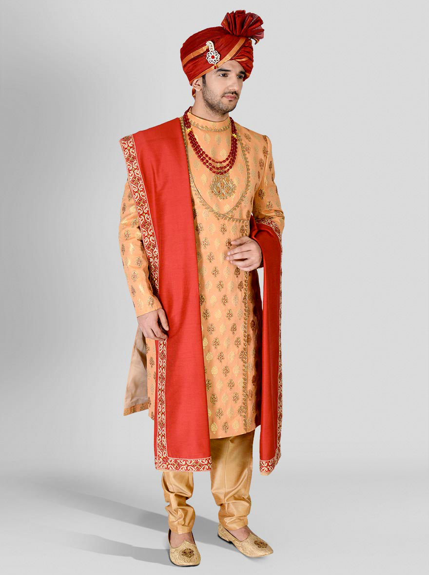 Stylish Orange & Golden Sherwani featuring a mandarin collar and minimal embroidery for grooms.