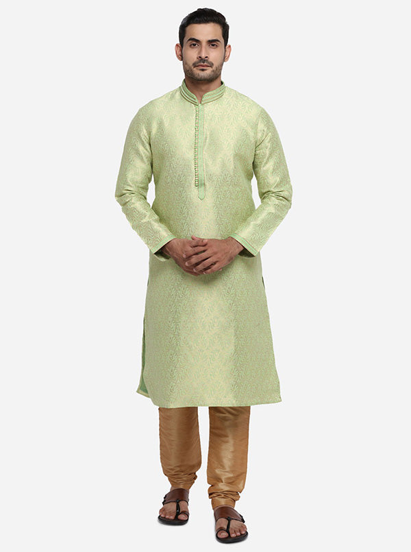 Stay chic in the USA with this pista green and golden self-design kurta set for men.