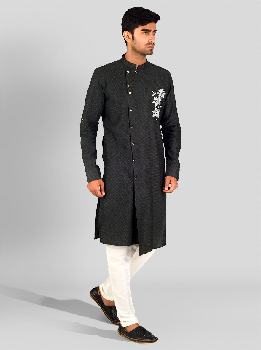 Trendy dark green kurta pajama featuring a stylish stripe pattern, ideal for day or night events.