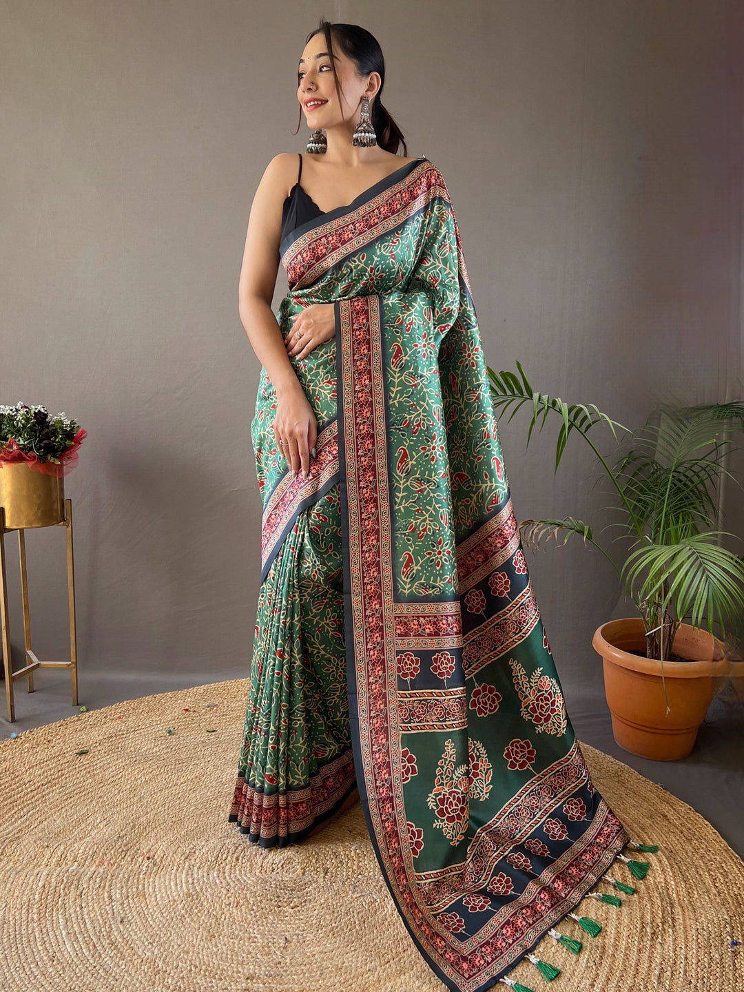 Green silk saree crafted for elegance and style.