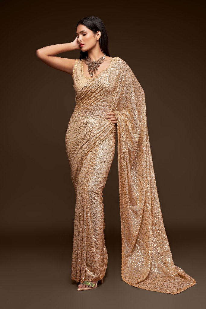 A sophisticated beige saree featuring intricate sequins embroidery, perfect for elegant occasions as a designer saree.