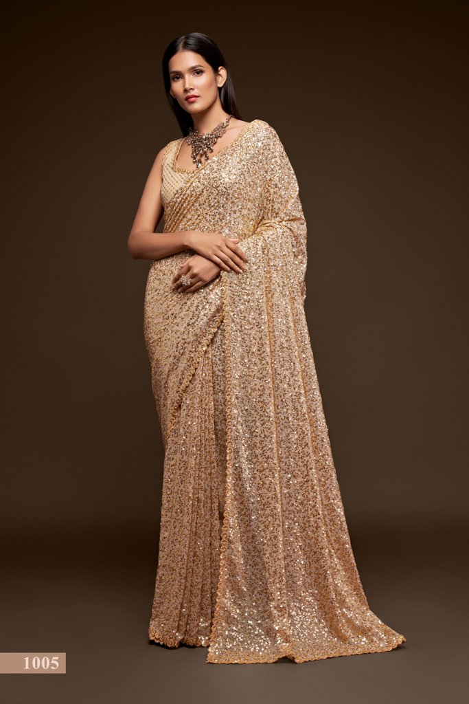 Timeless beige Indian saree with exquisite sequins work, ideal for festive celebrations and traditional Indian sari gatherings.