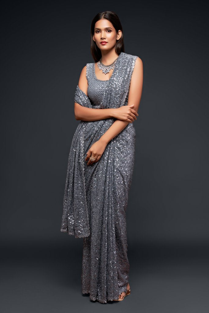 Stunning grey Indian saree adorned with exquisite sequins, designed to impress at weddings and parties as a fancy saree.