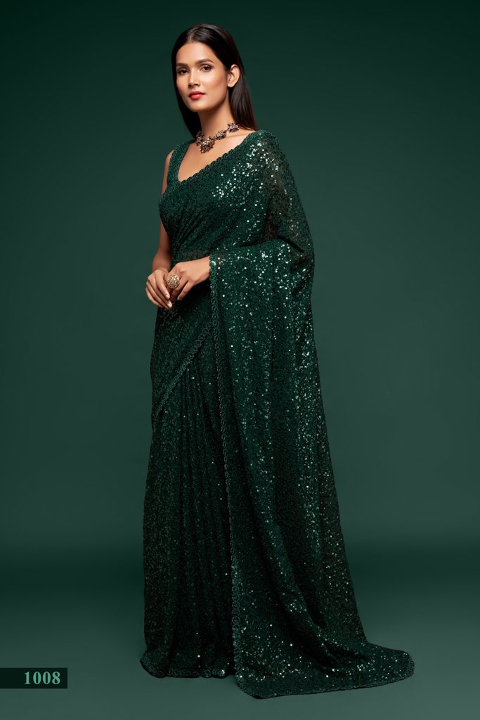 A captivating dark green saree adorned with intricate sequins embroidery, perfect for festive celebrations and as an Indian wedding saree.