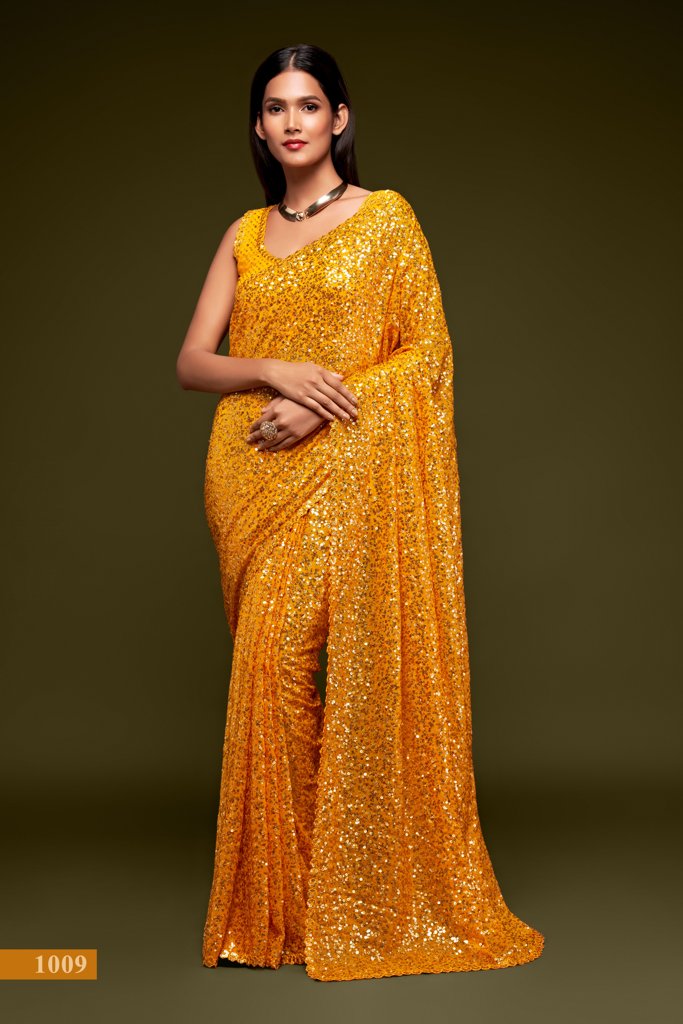 A vibrant yellow saree embellished with intricate sequins embroidery, perfect for joyous celebrations and as a designer saree.