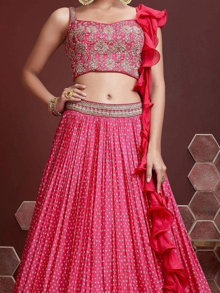 Designer pink lehenga choli with ruffle work dark pink dupatta.