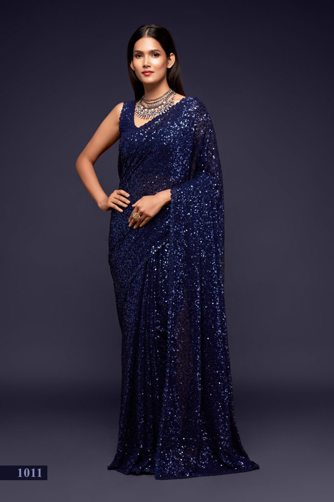 A stunning dark blue saree embellished with intricate sequins embroidery, perfect for elegant occasions as a designer saree.