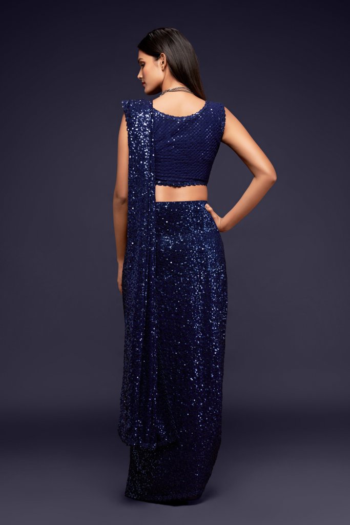 Gorgeous dark blue sadi showcasing beautiful sequins work, ideal for adding sophistication to any event or traditional Indian sari function.