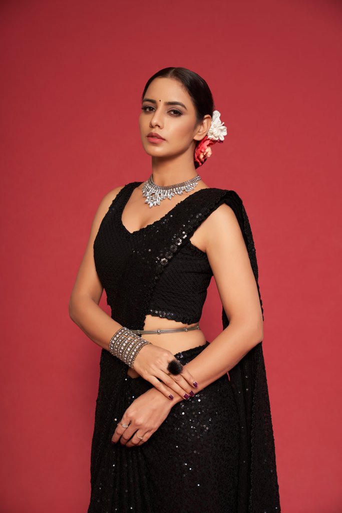 Gorgeous black sadi showcasing intricate sequins embroidery, designed to make a statement at any event.