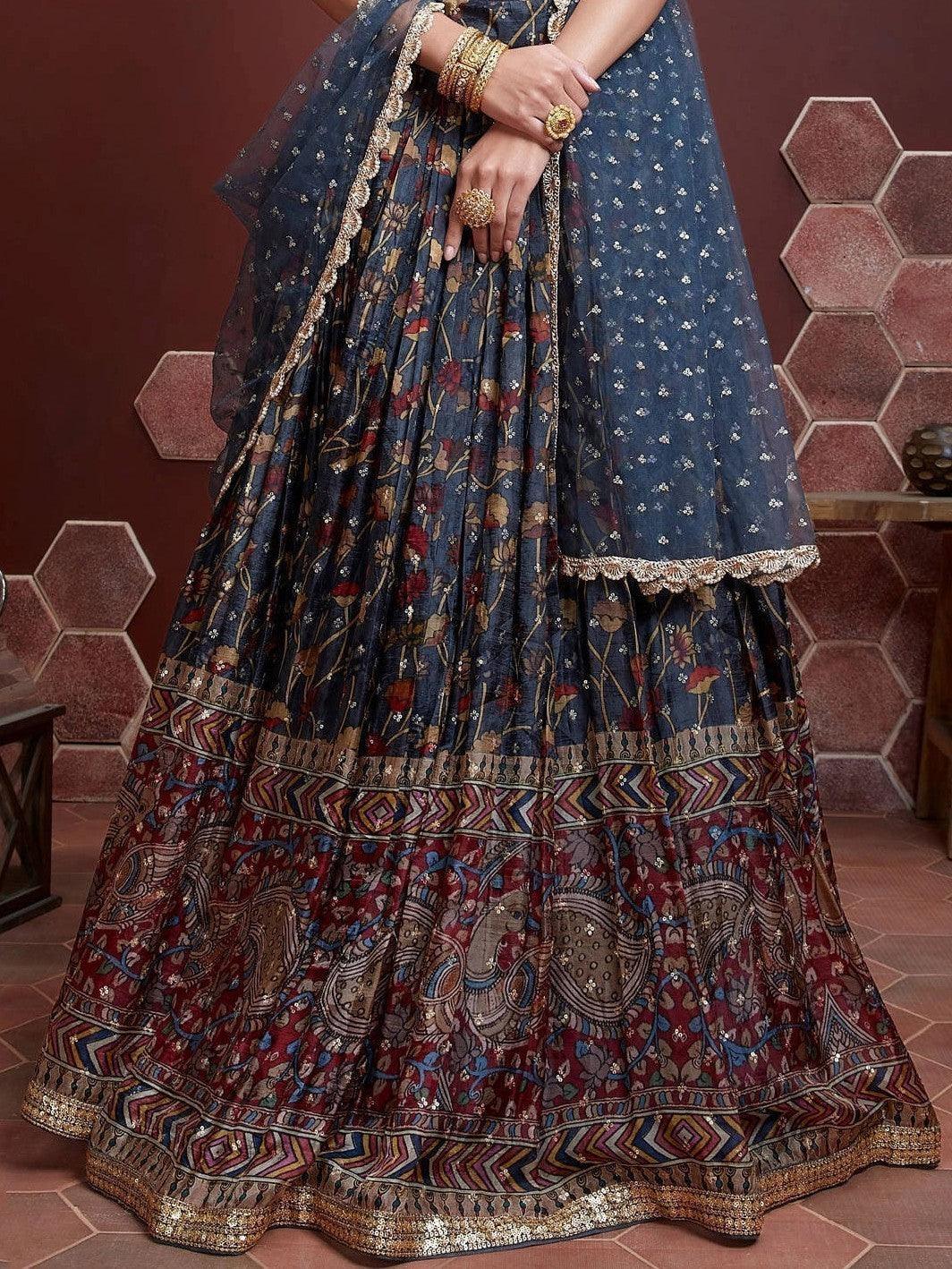 Beautiful blue party wear lehenga with net dupatta and ruffles.