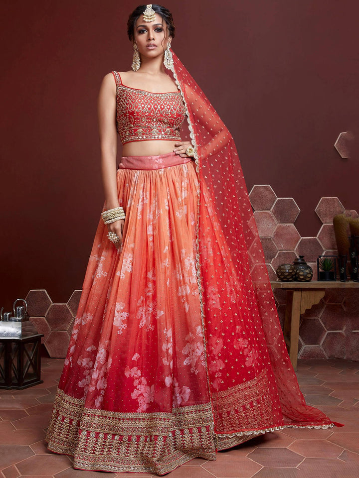 Orange digital printed lehenga choli with organza silk and embroidery.