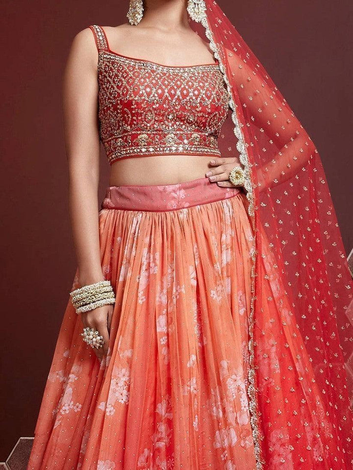 Designer orange lehenga choli with matching banglory silk choli.