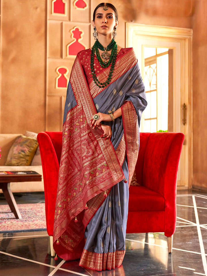 Red silk saree crafted for elegance and style.