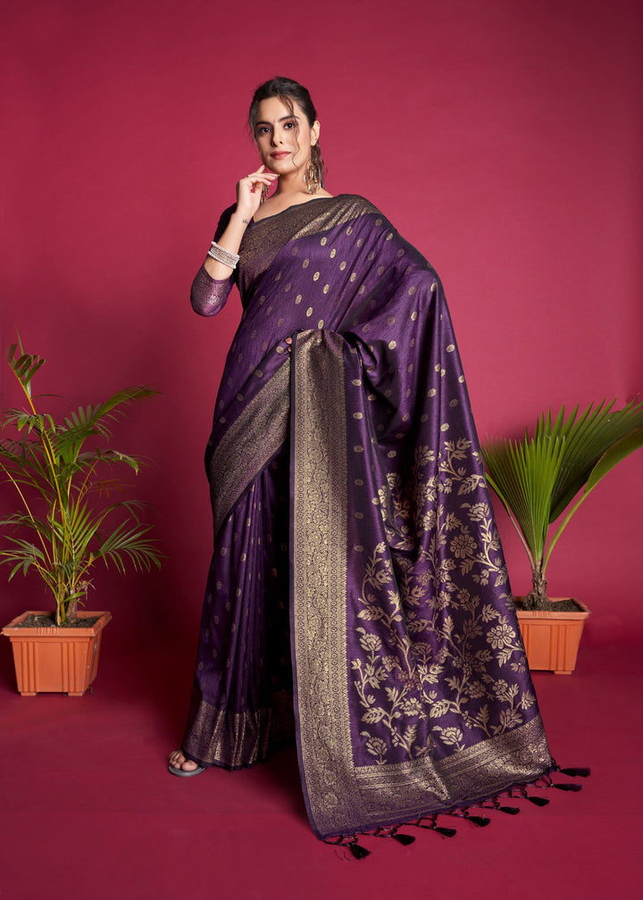 Timeless purple Indian saree crafted with Banarasi raw silk, featuring zari weaving and a sophisticated border for a grand look.