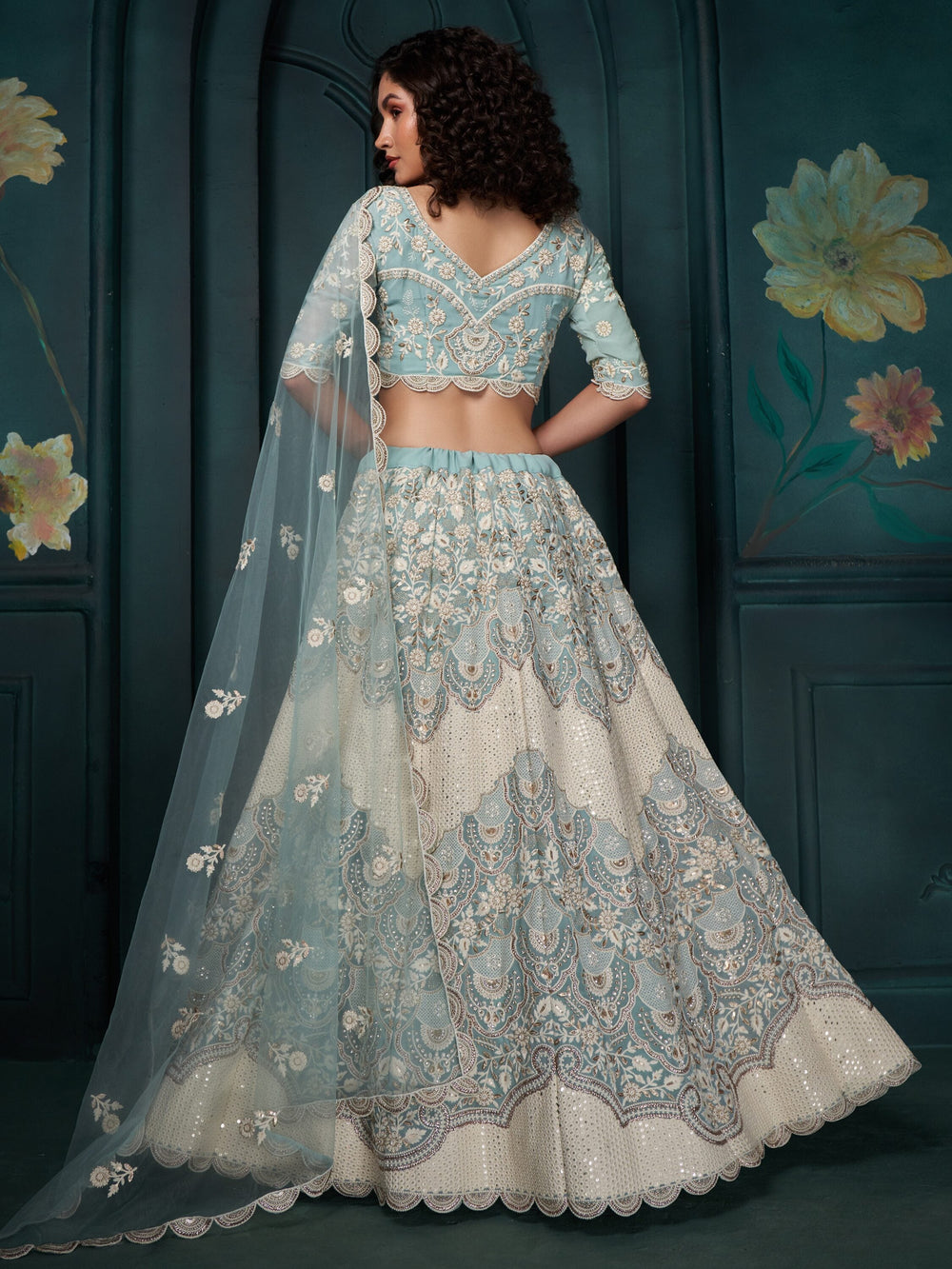 Bewitching Firozi Sequins Georgette Designer Lehenga Choli