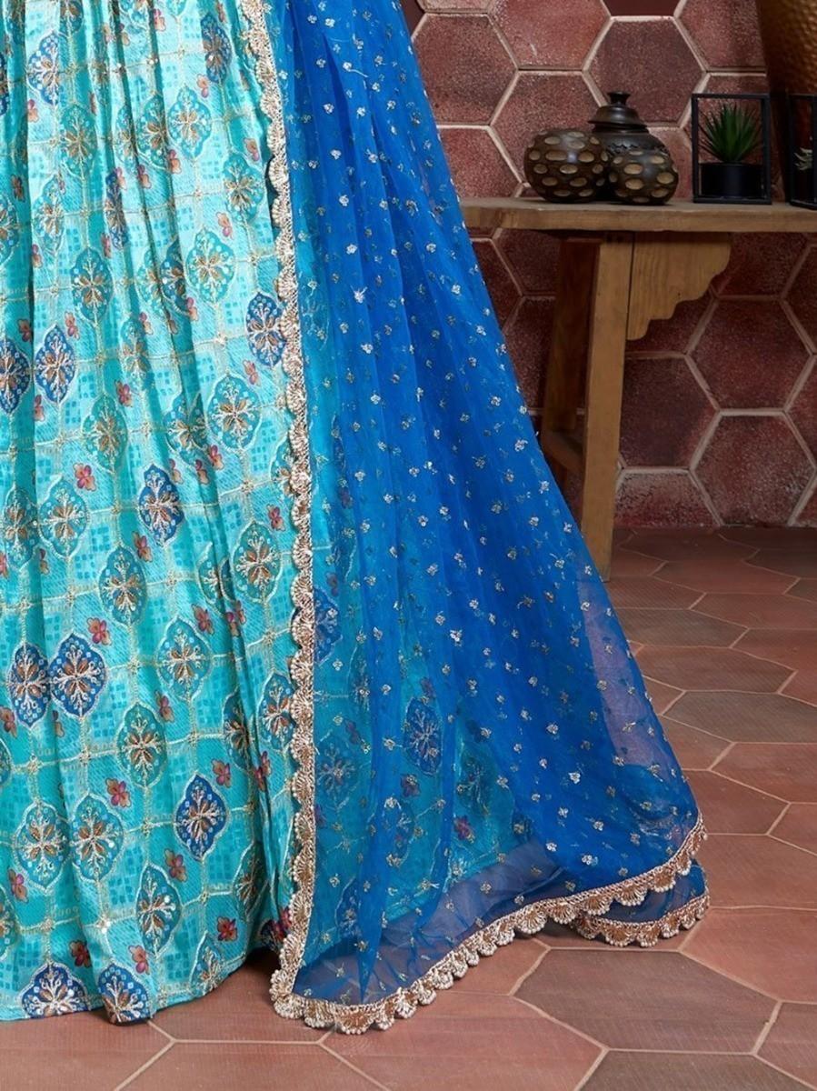 Sky blue printed lehenga choli with designer choli and net dupatta.