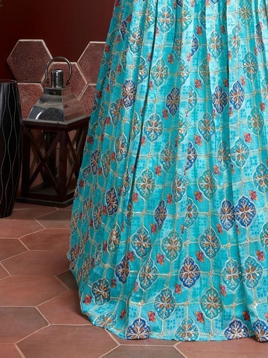 Sky blue lehenga with sequins work and embroidered choli.