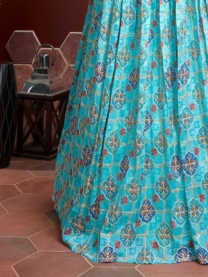 Sky blue lehenga with sequins work and embroidered choli.