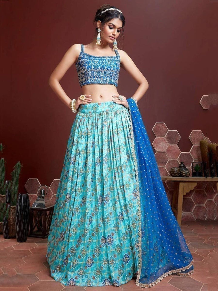 Sky blue fancy printed chinon silk lehenga choli with sequins embroidery.