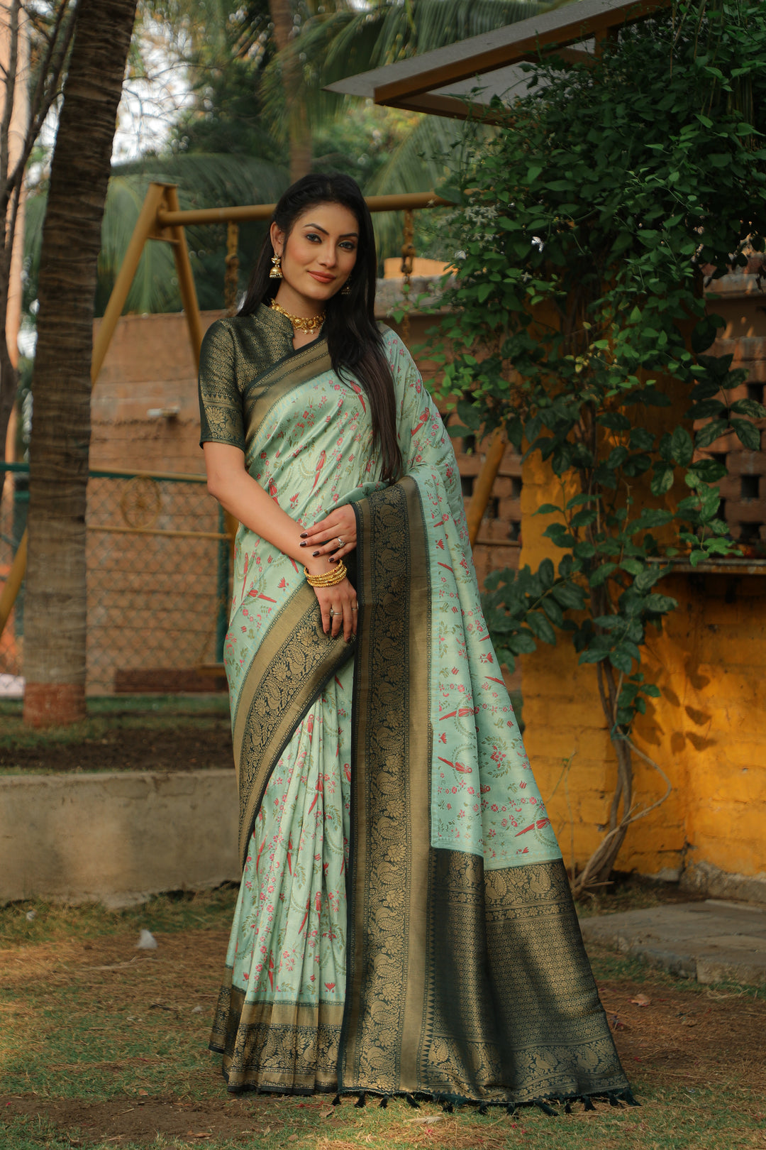 Fancy Mint green Indian saree with Kanjivaram detailing, a luxurious choice for your special occasions.