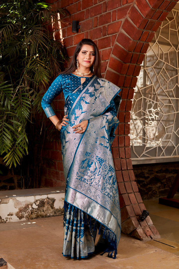 Graceful blue saree with a shimmering satin finish, crafted with a woven pallu and intricate details, perfect for special occasions.