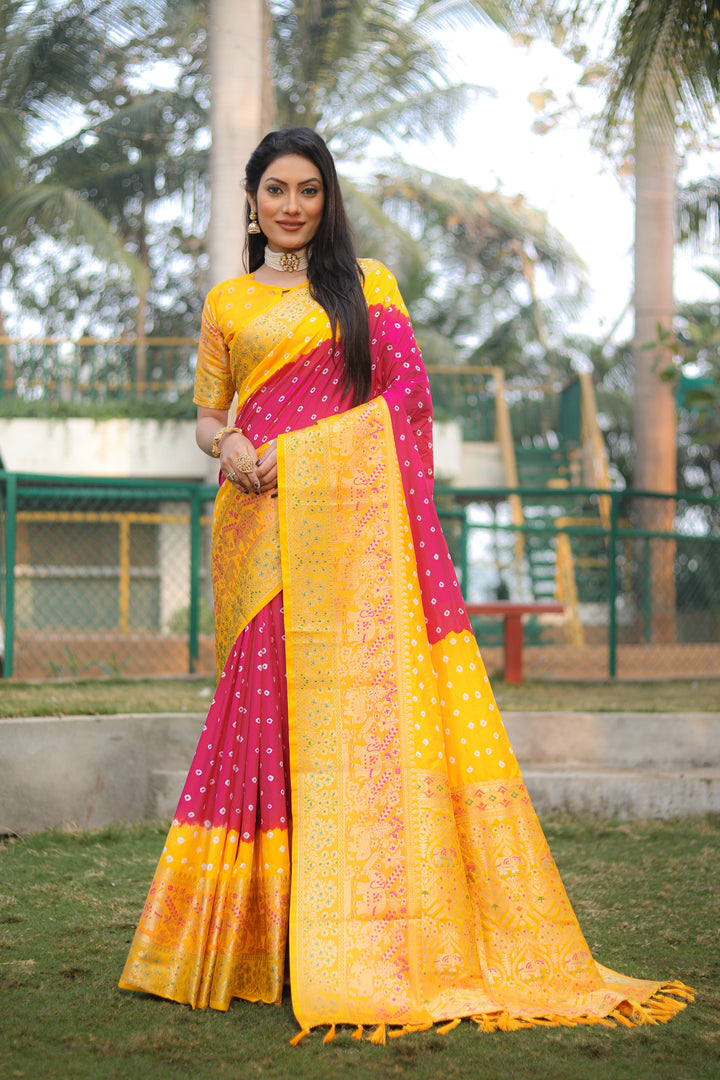 Yellow Bandhej Silk Saree with stunning Kanjivaram border and Minakari pallu, ideal for traditional events.