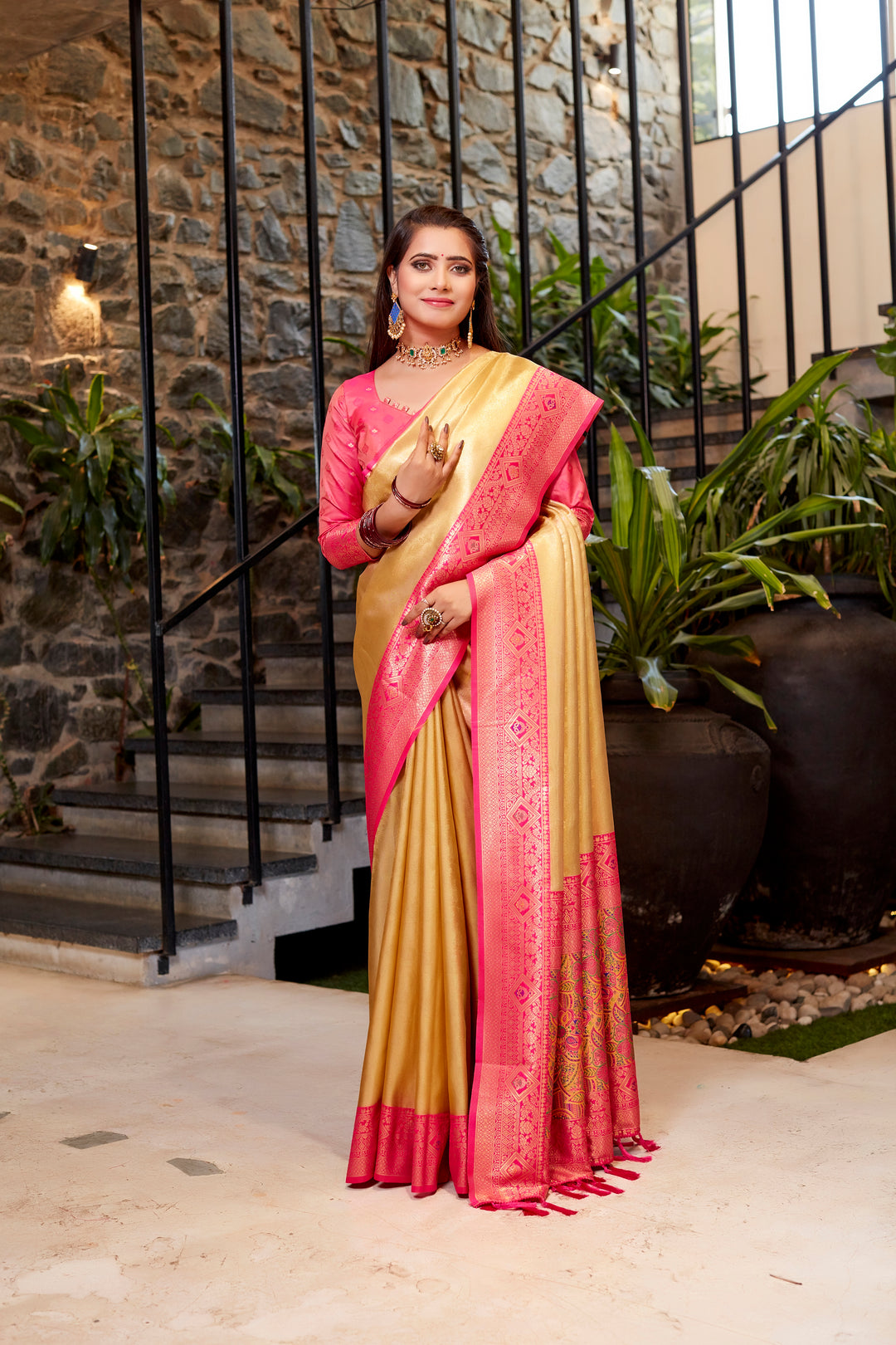 Timeless light-peach Tissue silk saree with gorgeous contrast border design and delicate weave.