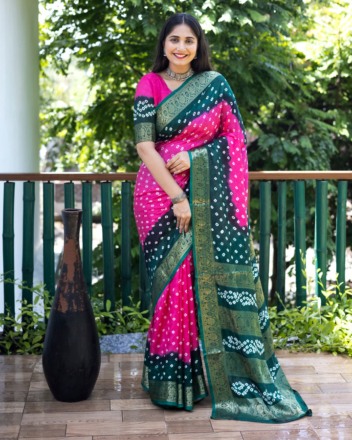 Beautiful pink Bandhej silk saree with intricate zari work and matching blouse, perfect for festive and bridal wear.