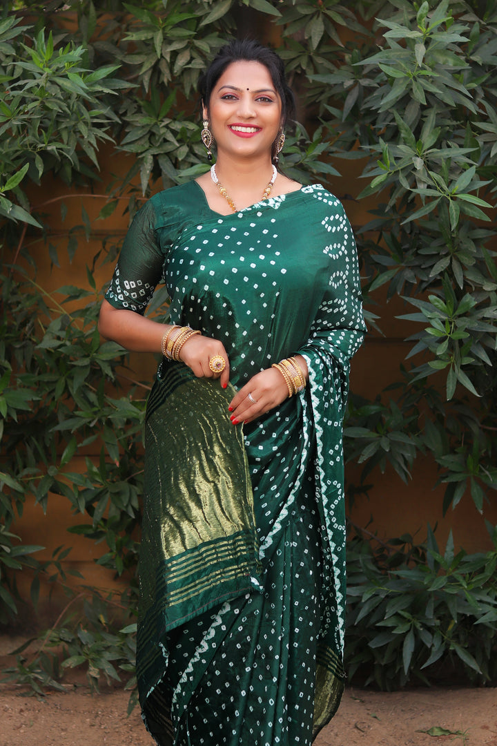 Teal green Bandhej silk saree with Zari Weaving pallu and Lagdi Patta, a stunning option for traditional festivals.