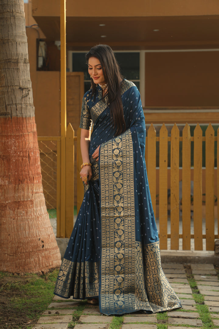 Beautiful teal blue Bandhej Kanjivaram silk saree with intricate zari weaving and a rich, elegantly woven pallu, ideal for weddings.