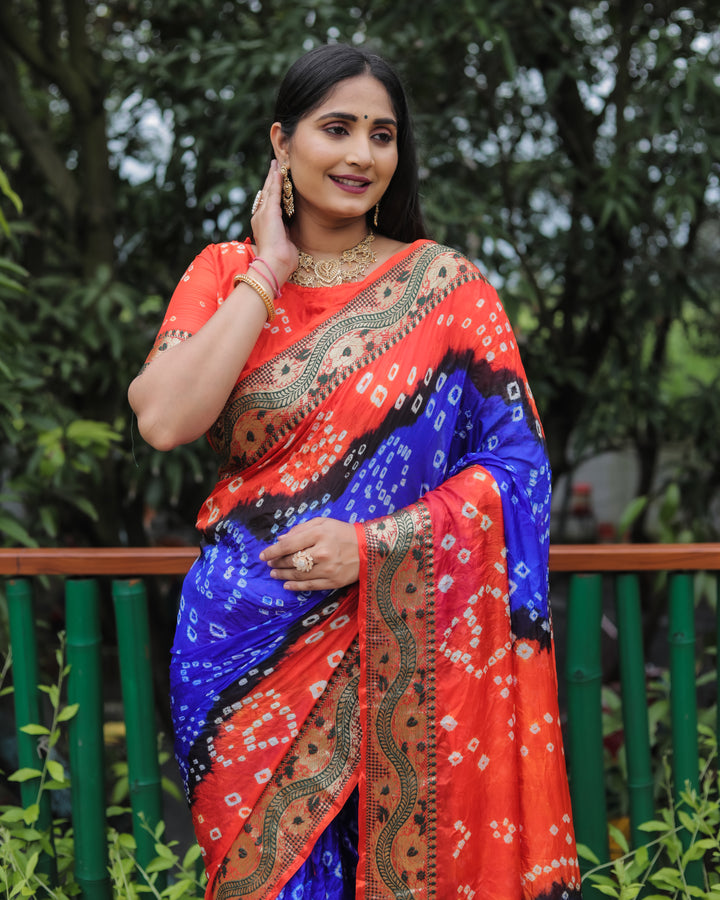 Royal-blue Bandhej Tapeta silk saree with intricate dual-color design, perfect for special occasions.