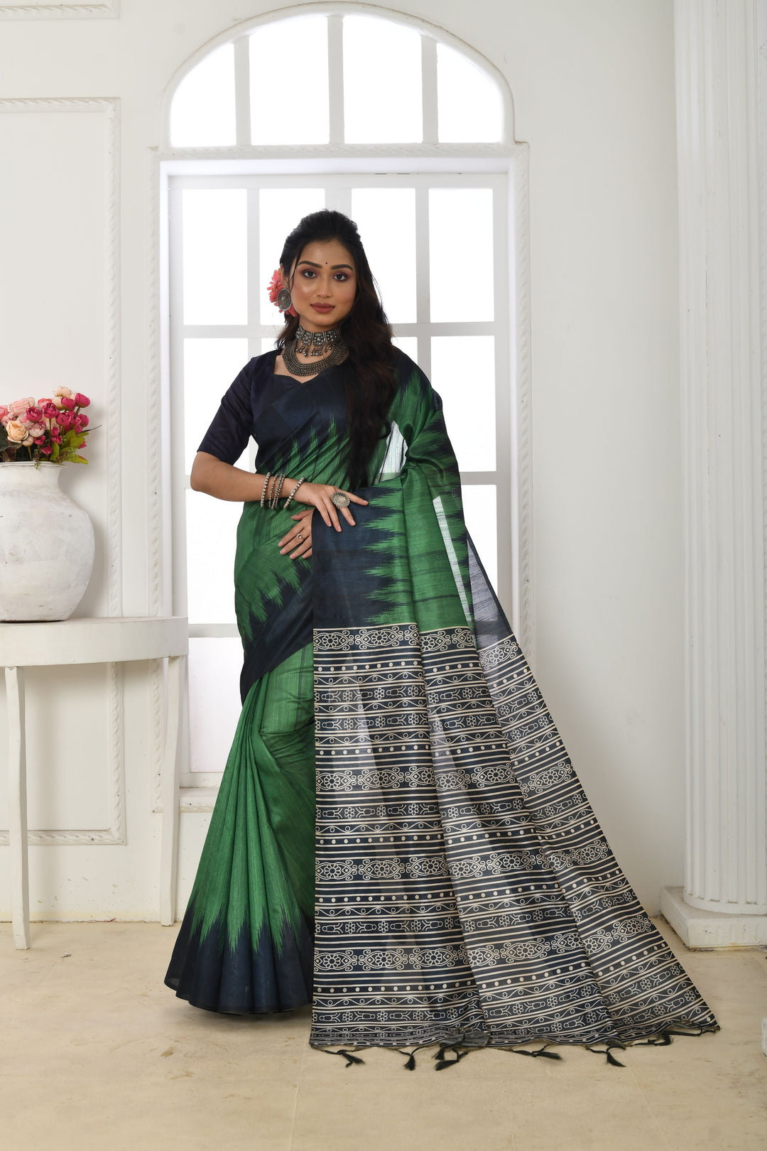 Soft Tussar silk saree with a printed pallu and temple border, perfect for festive occasions.