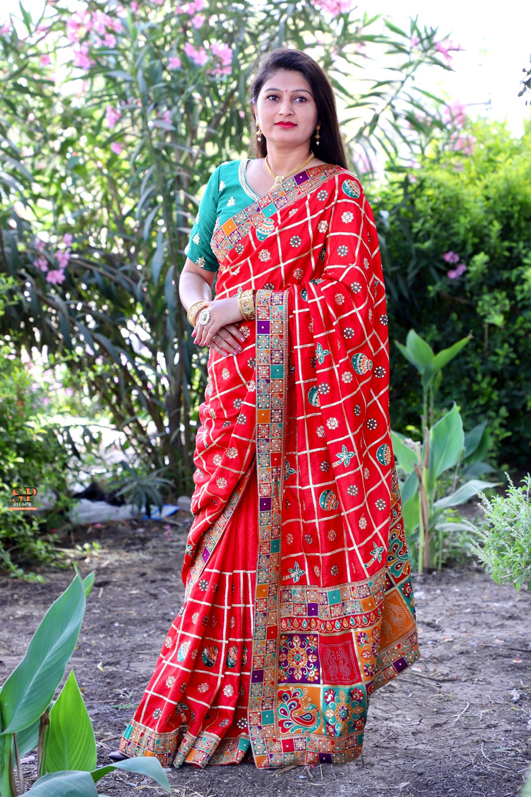 Yellow Dola Silk saree with intricate embroidery and diamond work, complemented by a lavish jacquard lace border.