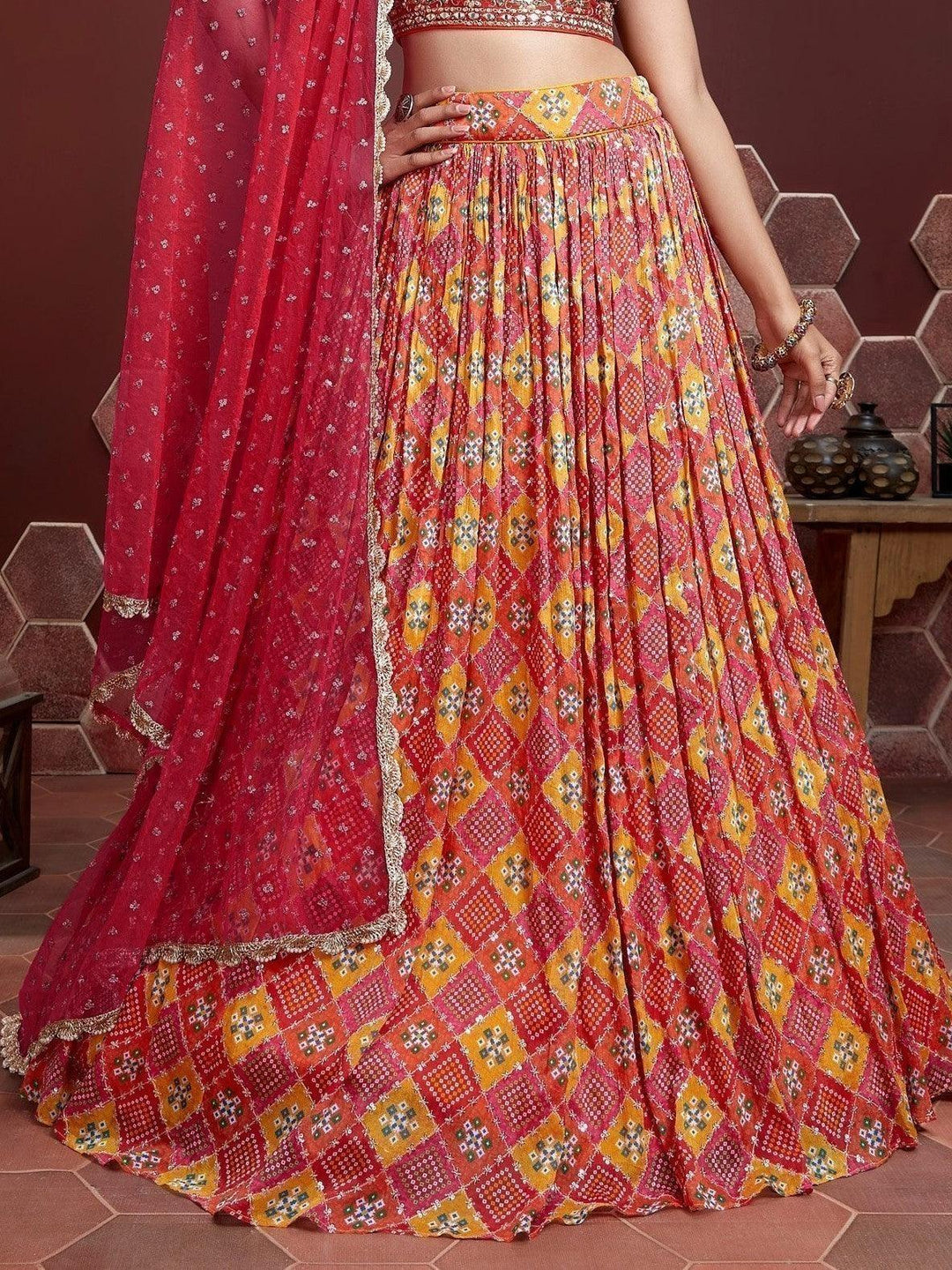 Beautiful red chinon silk lehenga with sequins and embroidery design.