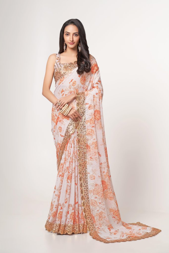 Elegant white floral print saree in organza with sequin embroidery details for festive occasions.