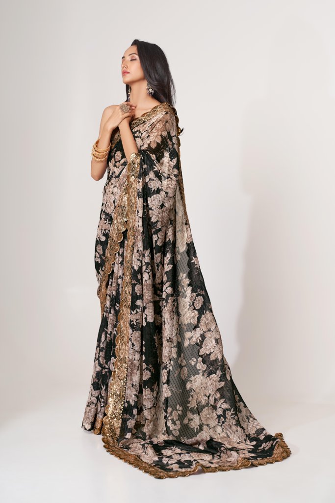 Stunning navy floral print saree in organza with intricate sequin embroidery for a luxurious feel.