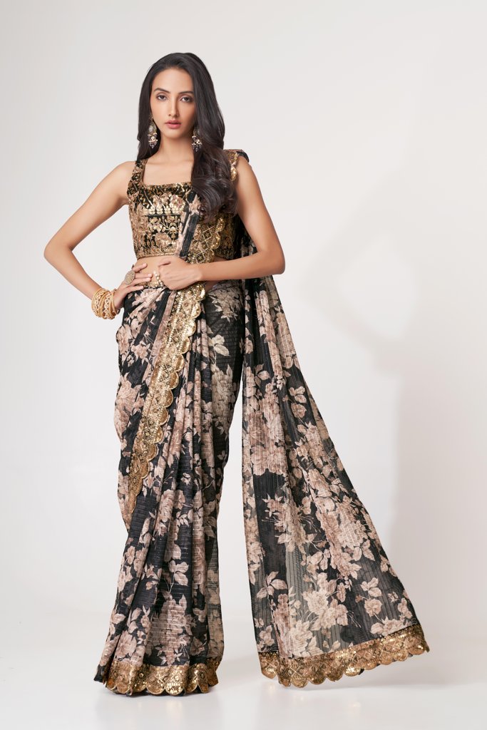 Elegant navy floral print saree with sequin details, ideal for evening functions.