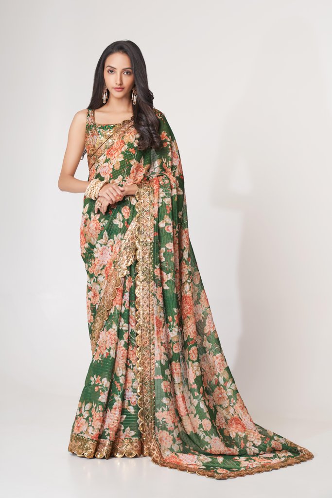 Stylish teal floral print saree with sequin embroidery, perfect for a festive occasion.