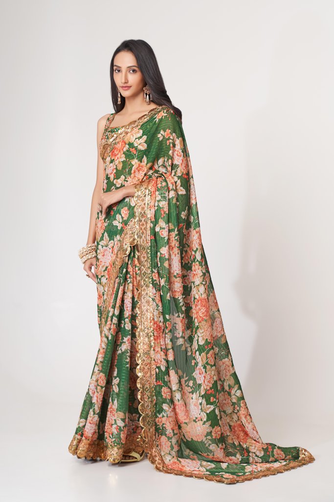 Beautiful teal floral print saree with sequin embroidery details for a traditional yet modern look.