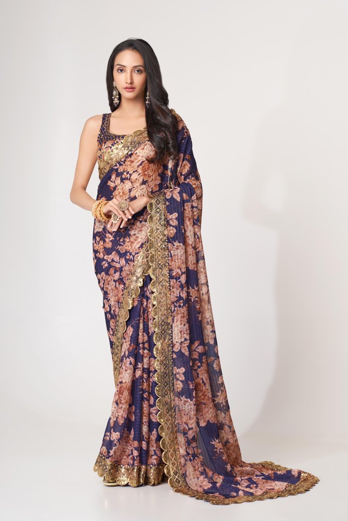 Graceful teal floral print saree with sequin embroidery details for wedding celebrations.