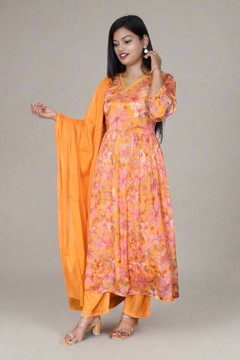 Mustard yellow Anarkali kurta set featuring a silk kurti and chiffon dupatta, perfect for festive occasions and elegant wear.