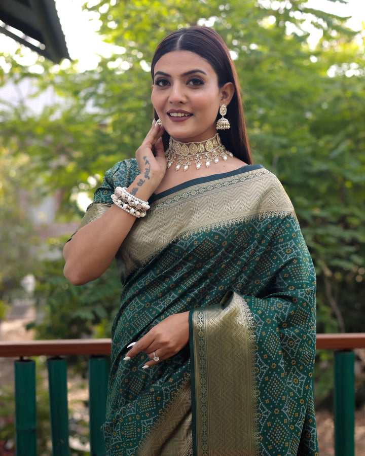 Elegant green Bandhej Patola silk saree featuring intricate patterns and rich zari weaving, perfect for festive occasions.