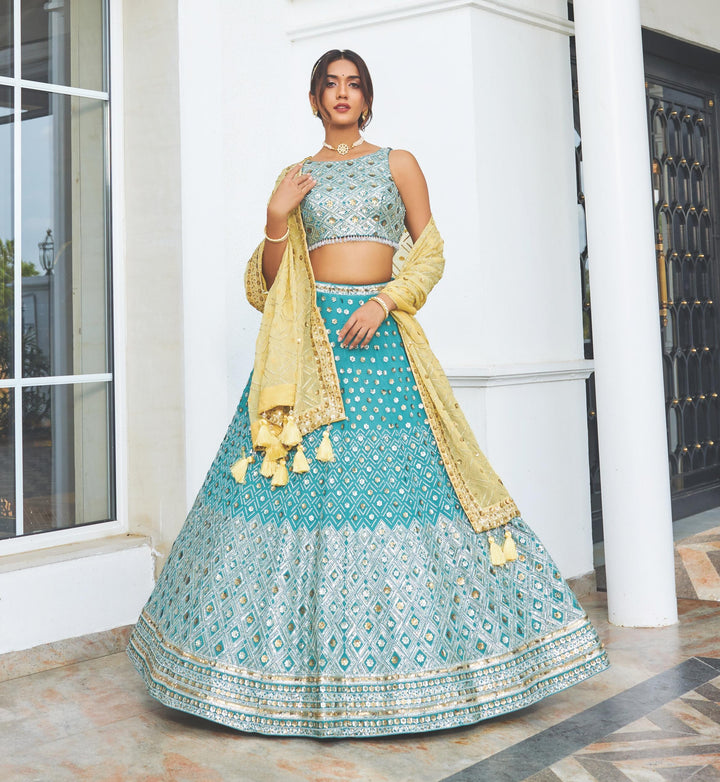 Stunning sky-blue georgette lehenga set, featuring elegant design elements, perfect for festive occasions and celebrations.